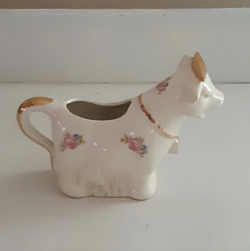 Vintage cow creamer White whit floral design and gold 5.5X7 inches